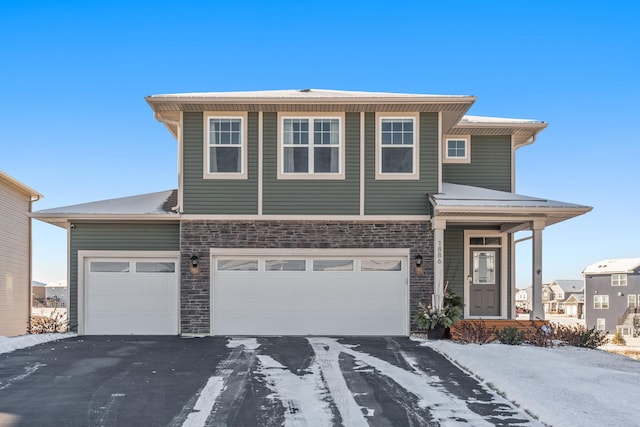 view of front of property featuring a garage