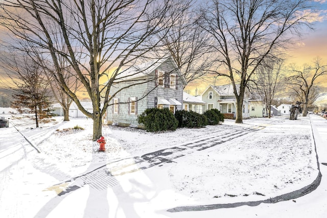 view of yard layered in snow