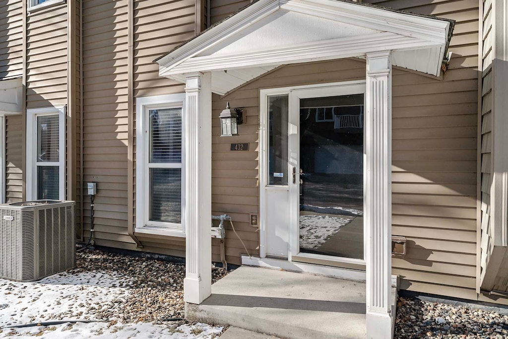 property entrance with central air condition unit