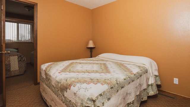 bedroom featuring carpet floors