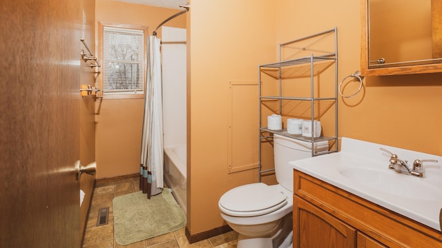 full bathroom featuring tile patterned flooring, vanity, shower / bath combination with curtain, and toilet