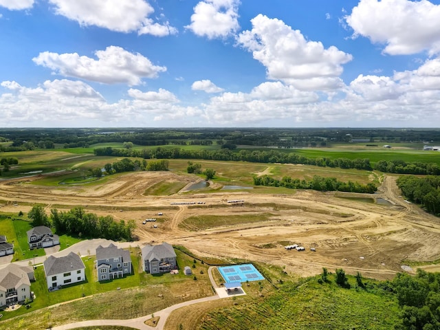 birds eye view of property featuring a rural view