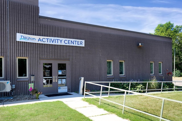 view of building exterior with ac unit