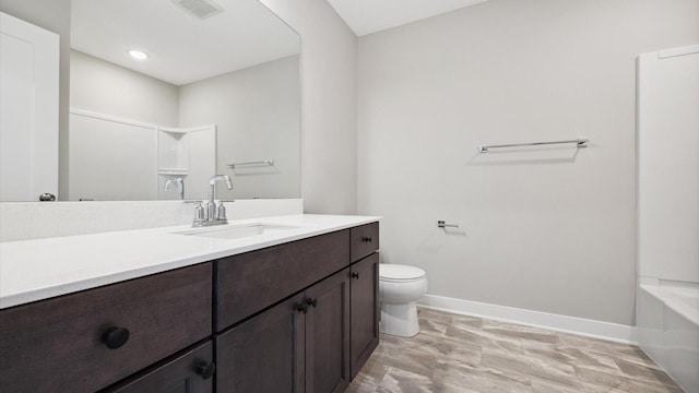 full bathroom with toilet, tub / shower combination, and vanity