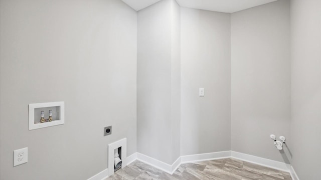 laundry area with washer hookup, electric dryer hookup, and hookup for a gas dryer