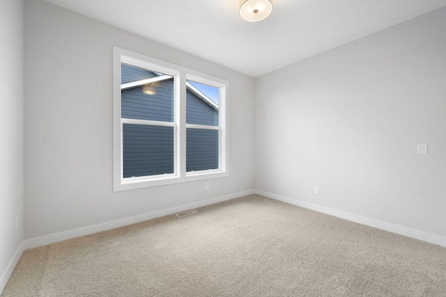 view of carpeted spare room