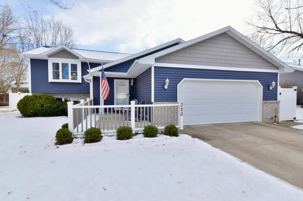 view of front of home with a garage