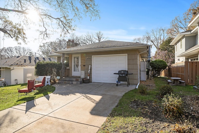 view of front facade with a front lawn and a garage