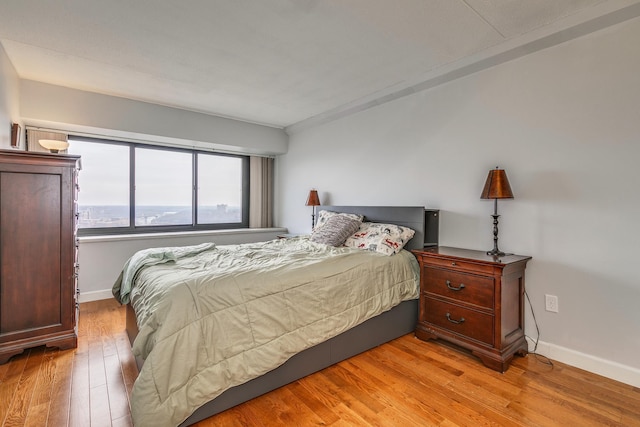 bedroom with light hardwood / wood-style floors