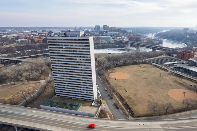 birds eye view of property with a water view