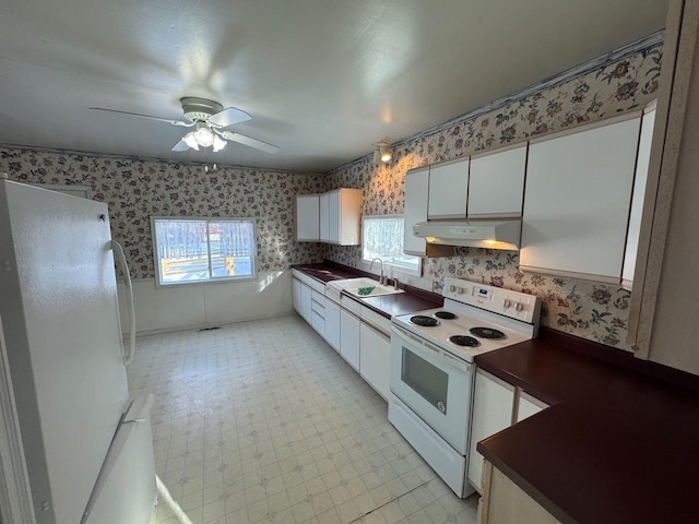 kitchen with white cabinetry, white appliances, ceiling fan, and sink