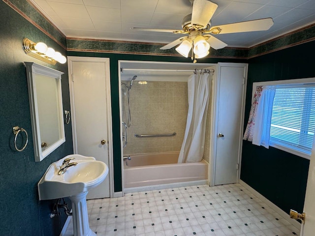 bathroom featuring shower / bathtub combination with curtain, crown molding, and ceiling fan