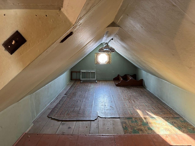 bonus room with vaulted ceiling