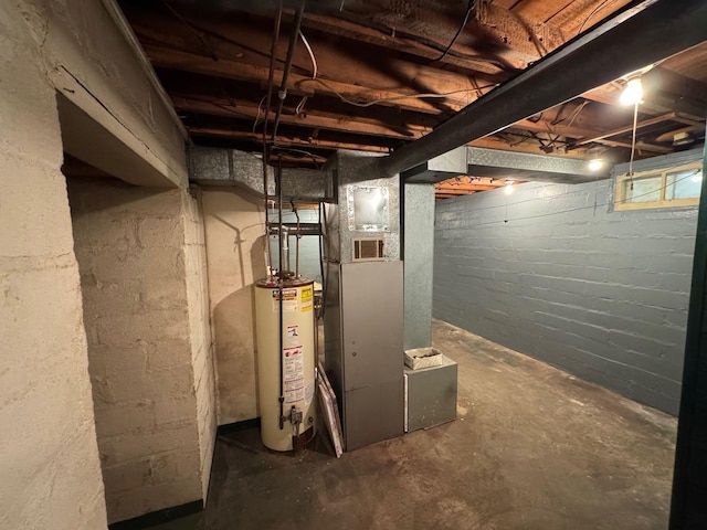 utility room featuring heating unit and water heater