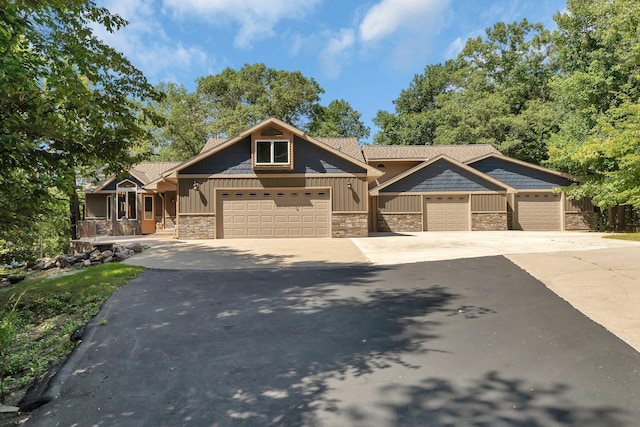 craftsman inspired home with a garage