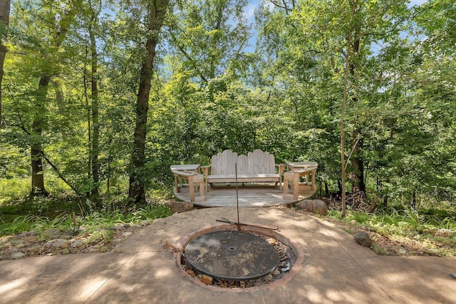 view of patio featuring a fire pit