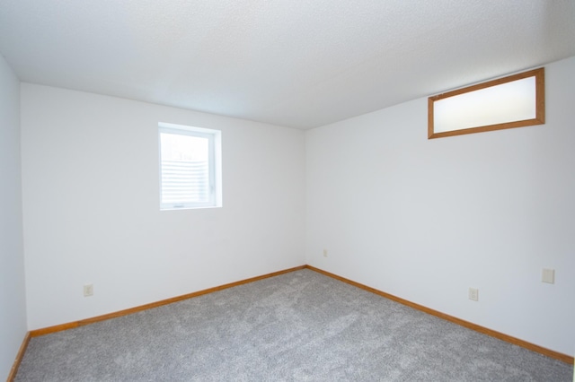 empty room with carpet flooring