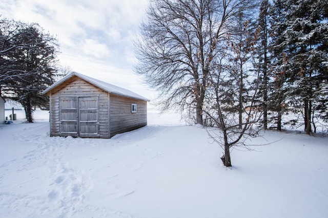 exterior space featuring a storage unit