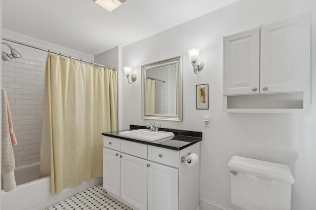 full bathroom with vanity, shower / bathtub combination with curtain, and toilet