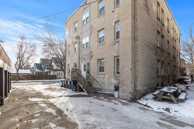 view of snow covered property