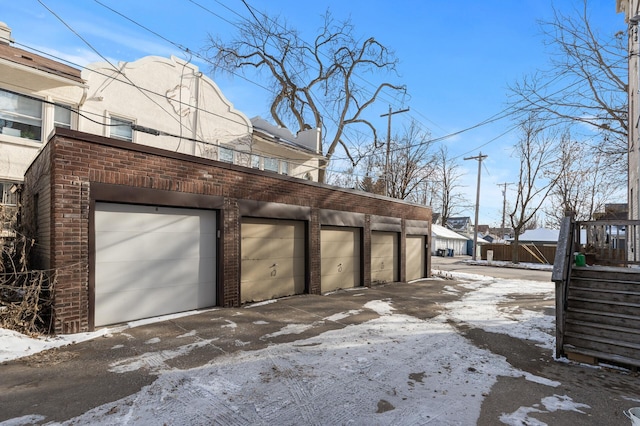 view of snow covered garage