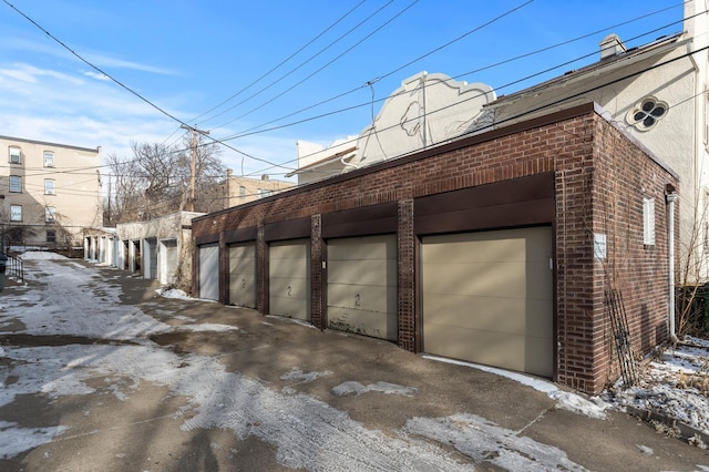 view of snow covered garage