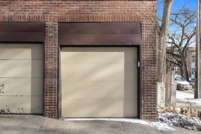 view of snow covered garage