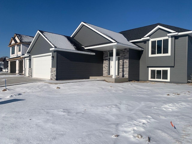 view of front of property with a garage