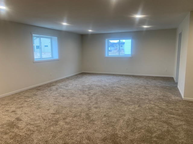 unfurnished room featuring carpet floors