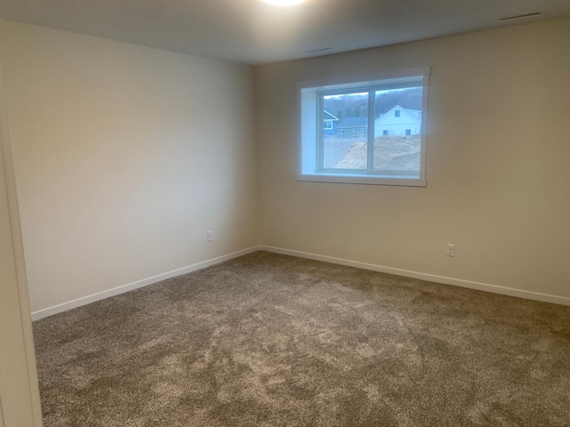 empty room featuring carpet