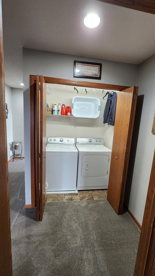 laundry room with dark colored carpet and separate washer and dryer