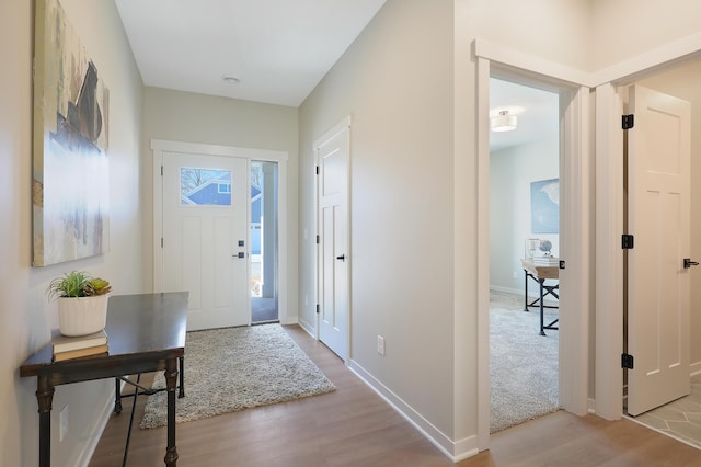 entrance foyer featuring light wood-type flooring