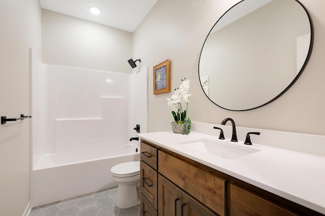 full bathroom featuring toilet, shower / tub combination, vanity, and tile patterned floors