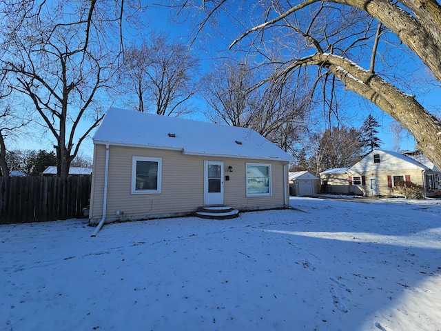 view of front of property with a storage unit