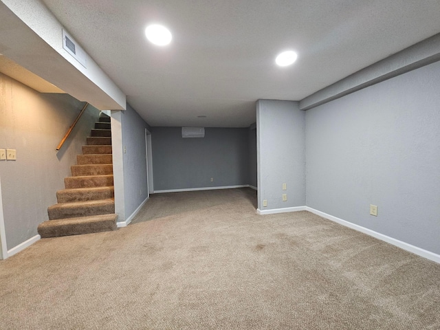 basement with carpet flooring