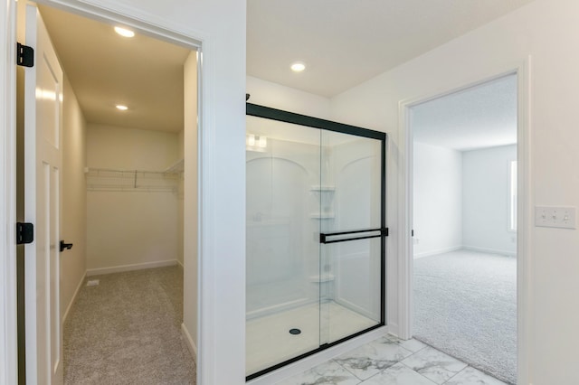 bathroom with an enclosed shower