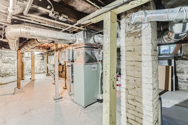 basement featuring heating unit