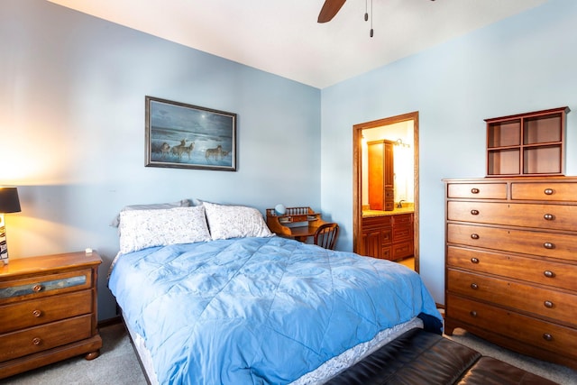 bedroom featuring ensuite bath, ceiling fan, and carpet floors