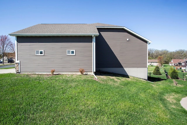 view of outdoor structure featuring fence