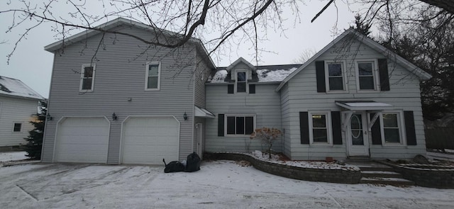 view of front of home with a garage