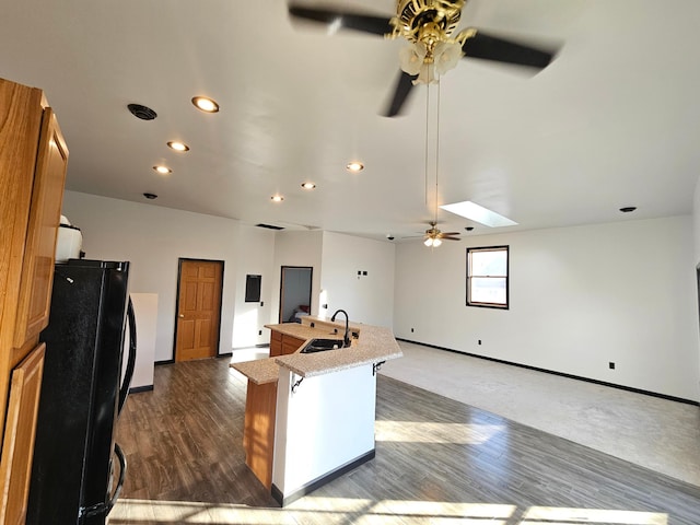 412 Prairie Ave, Faribault, MN 55021 - kitchen with ceiling fan, a sink, freestanding refrigerator, recessed lighting, and open floor plan