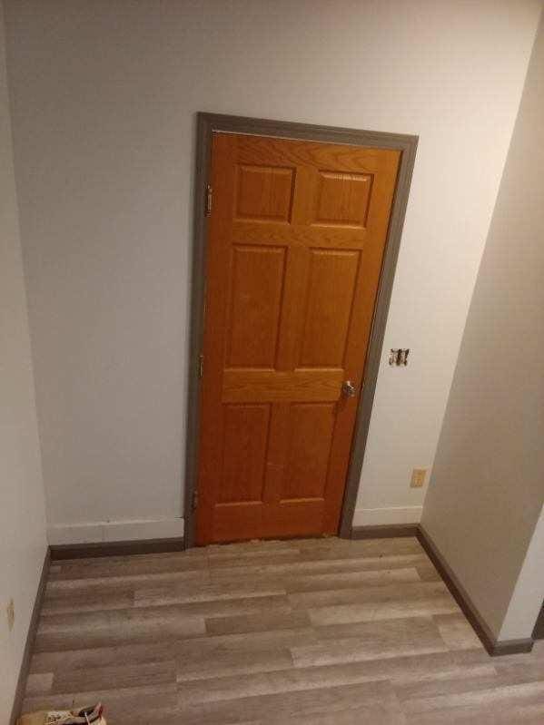 412 Prairie Ave, Faribault, MN 55021 - spare room with light wood-style flooring and baseboards