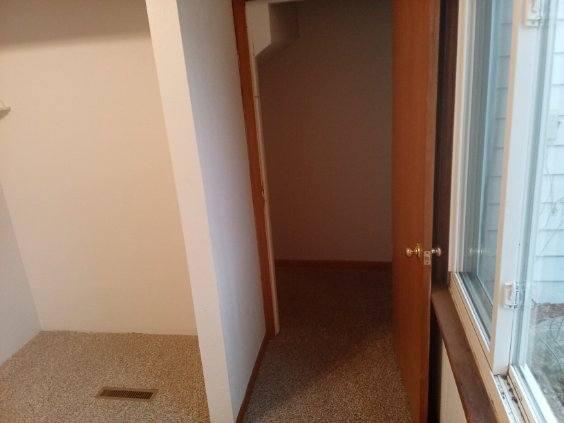 412 Prairie Ave, Faribault, MN 55021 - hall featuring carpet flooring