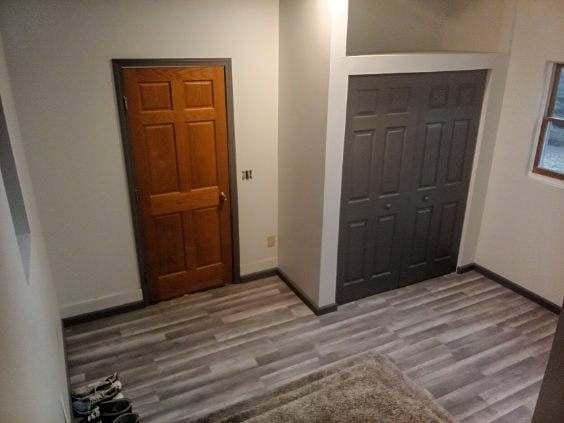 412 Prairie Ave, Faribault, MN 55021 - entryway featuring wood finished floors and baseboards