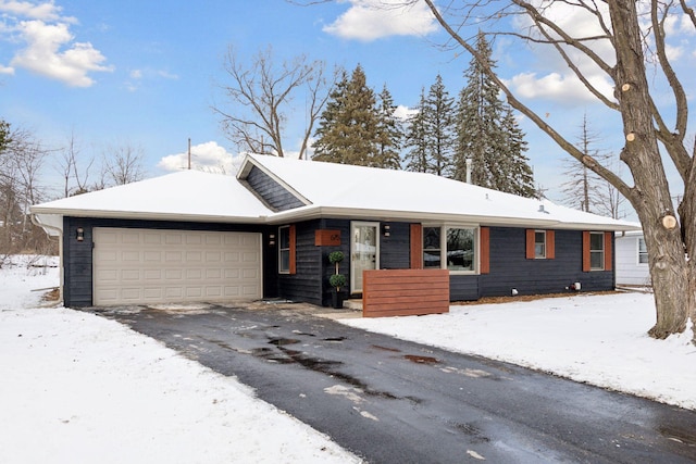 single story home featuring a garage