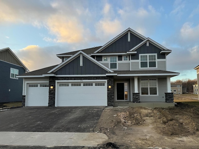 craftsman inspired home with a garage