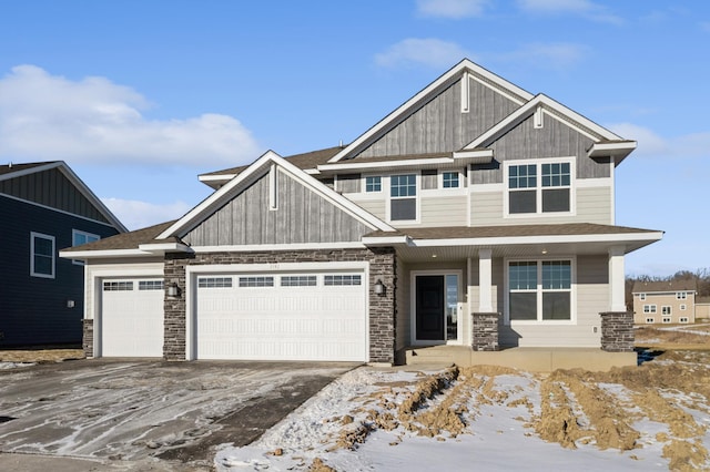 craftsman house featuring a garage and covered porch