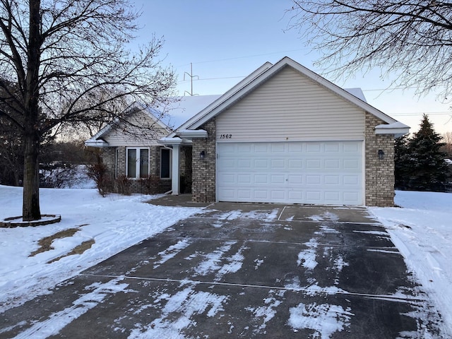 single story home with a garage