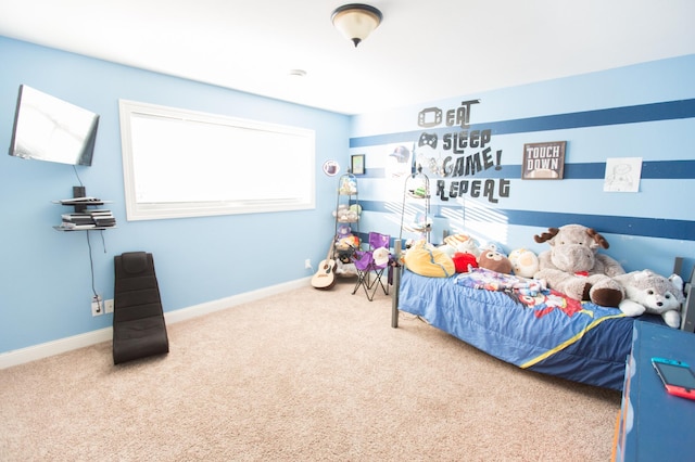 bedroom featuring carpet