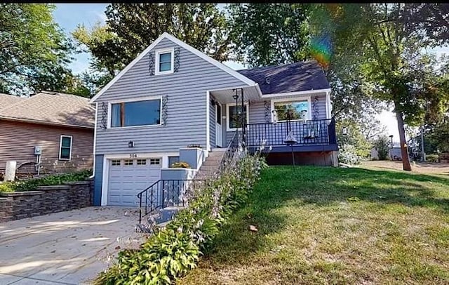 view of front facade with a front lawn and a garage